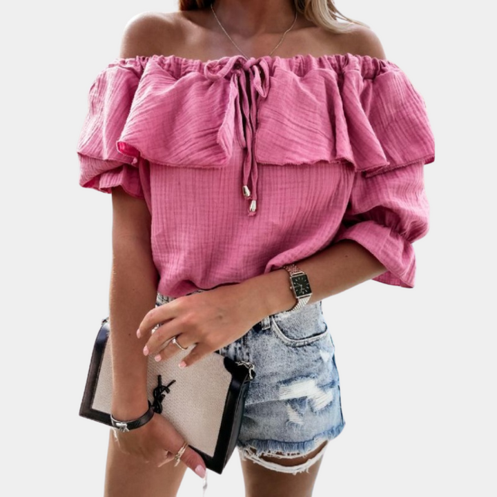 Afslappet off-shoulder bluse med flæser