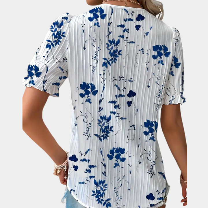 Blomstret damebluse med blondekant